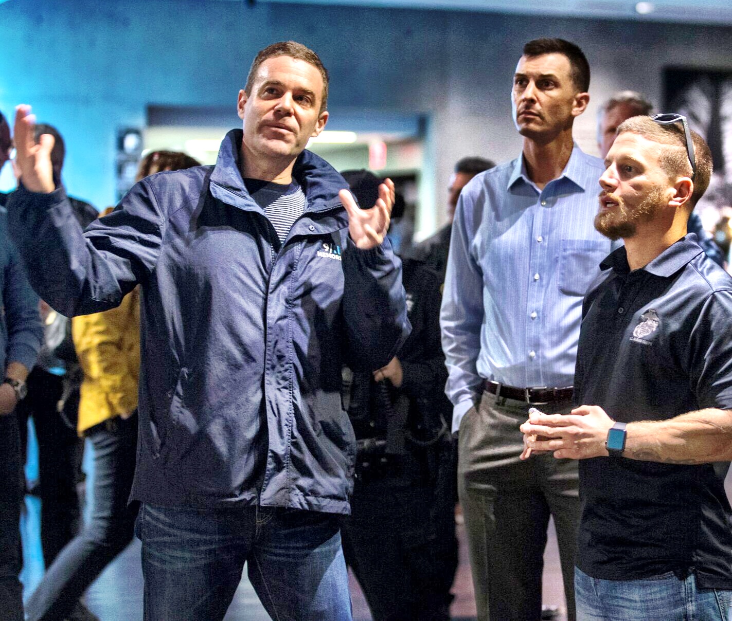 Joe Daniels with visitors inside the 9/11 Museum