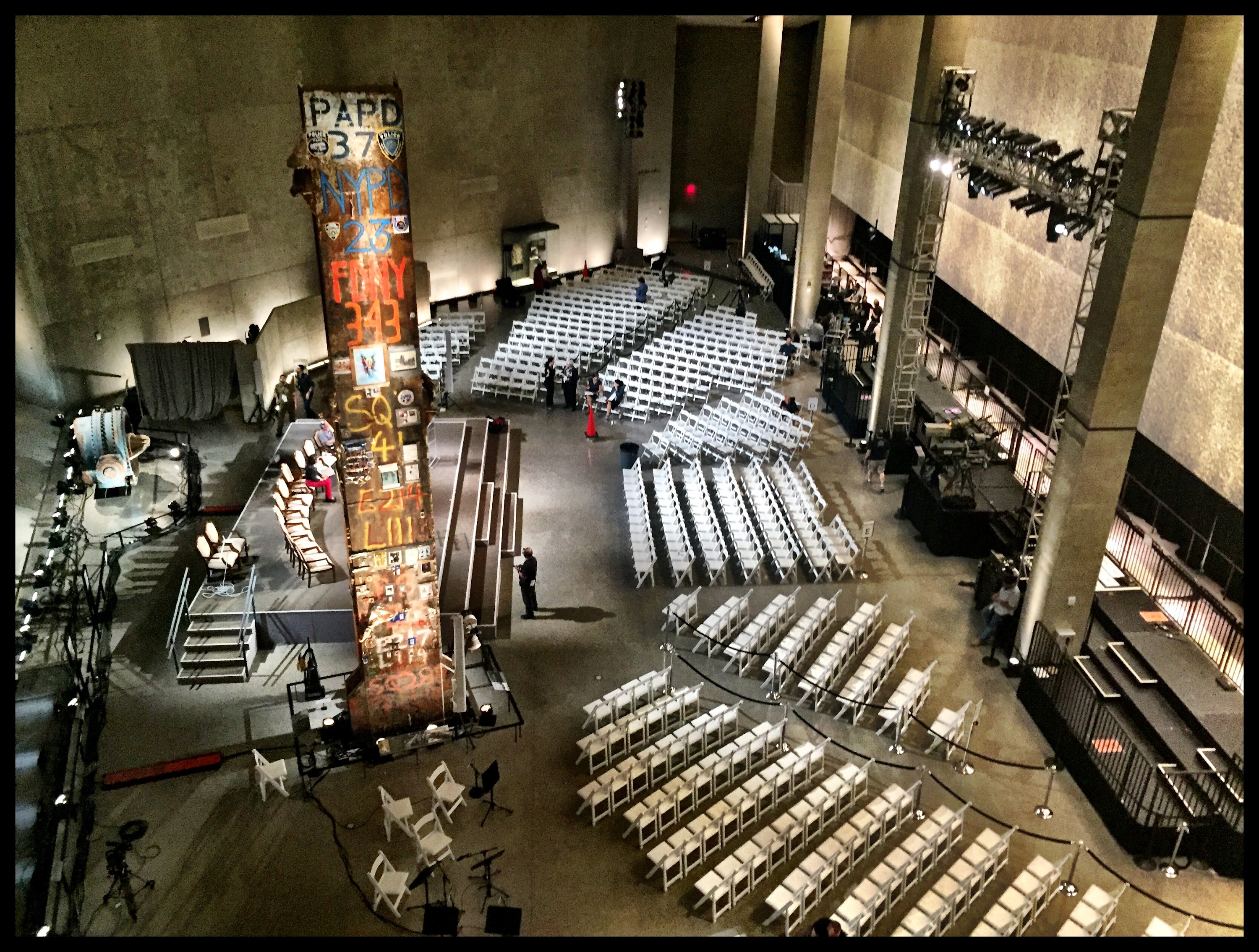 Museum hall with the preserved Last Column and rows of chairs